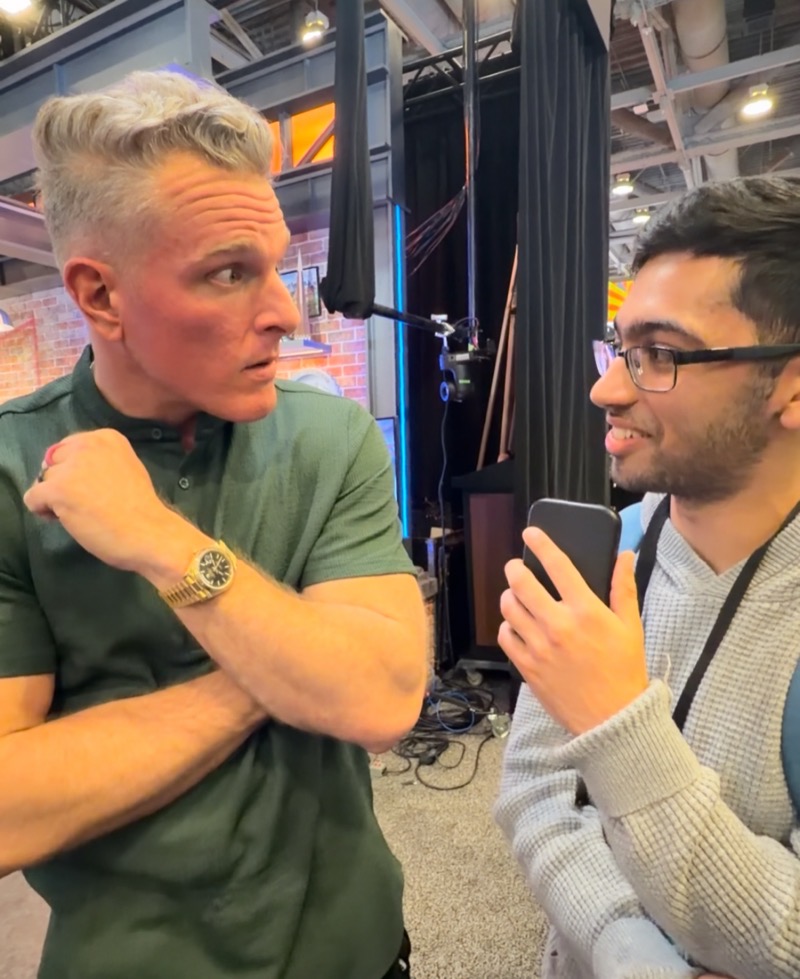 Kunal Ahuja with Pat McAfee at a sports card event